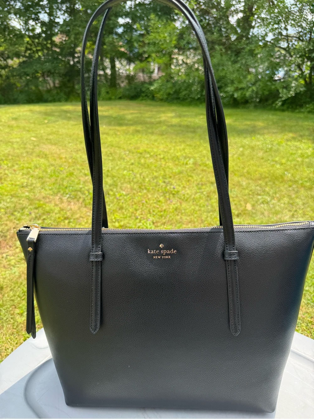 kate spade black leather pebbled tote with gold-tone logo